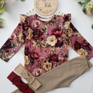 Bluzeczka w kwiaty zotylkami na ramionach