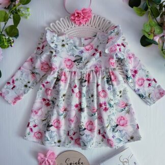 Sukienka z koronkowymi falbankami na ramionach