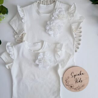 Śmietankowa bluzeczka z kwiatem