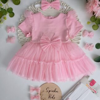 Różowa sukienka tiulowa z kokardą z przodu